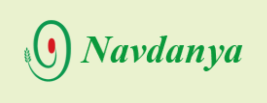 Dark Green Text against a light green background reads, "Navdanya". To the left of the text, a dark green logo in the shape of a sprout coils out from a red seed/circle. 